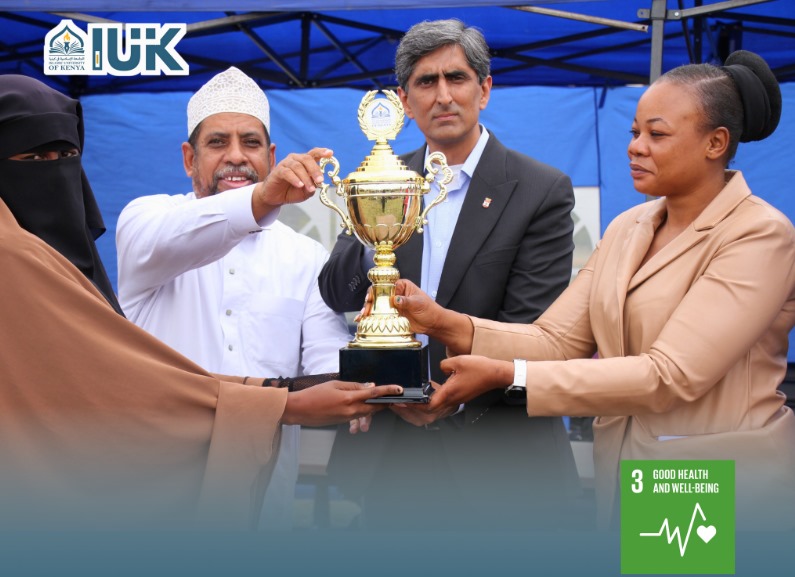A proud moment at IUK as the Vice Chancellor holds the Sport Week Trophy, celebrating students' talent, teamwork, and outstanding athletic achievements during the vibrant campus sports event.